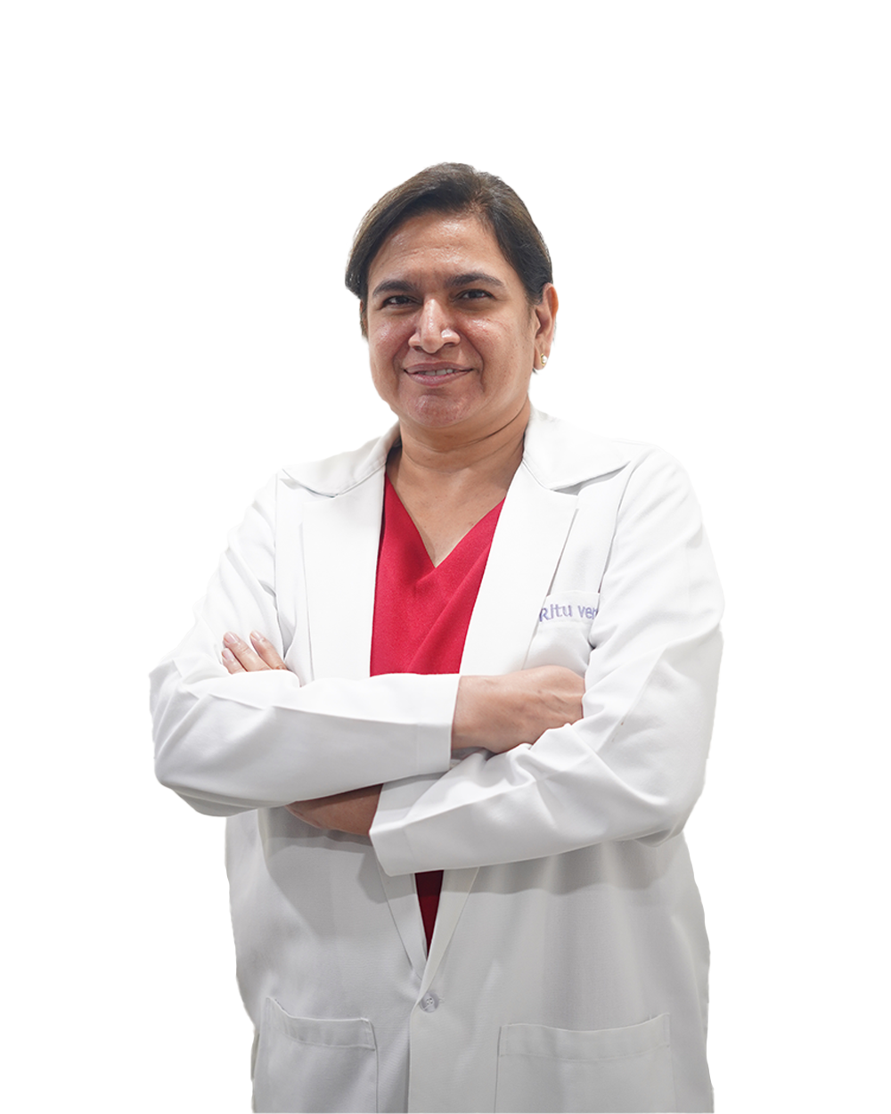 A retina specialist doctor in a white lab coat poses in front of a bright, colorful background, showcasing her professional demeanor.