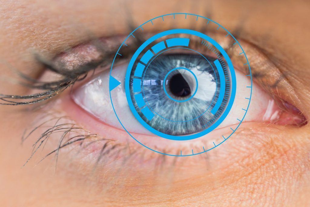 Close-up of a person's eye featuring a striking blue ring around the iris, taken at Retina Hospital in Indore.
